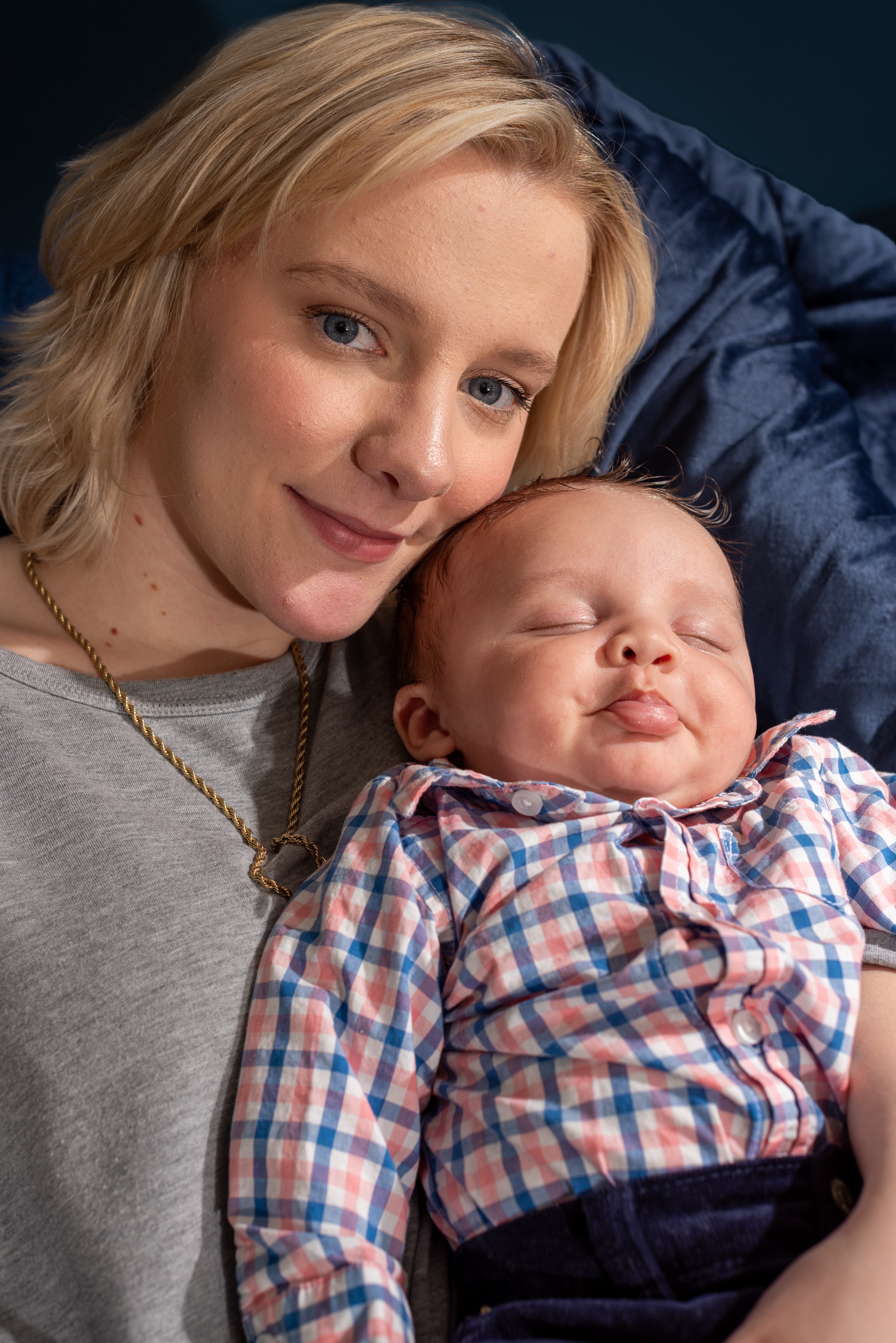 Mother with newborn baby, intimate portrait
